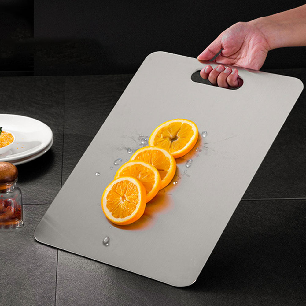 planche a decouper en titane orange