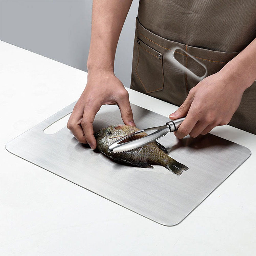 planche a decouper en titane poisson