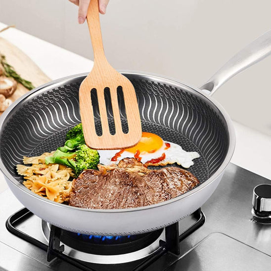 poele inox legumes oeuf
