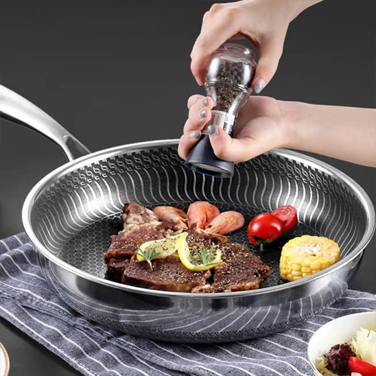 poele inox nourriture legumes viande