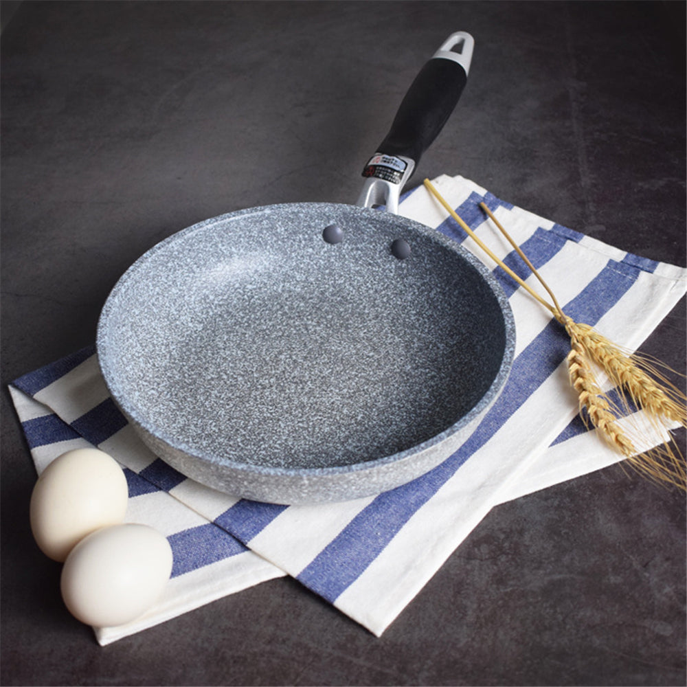 poele wok table oeuf